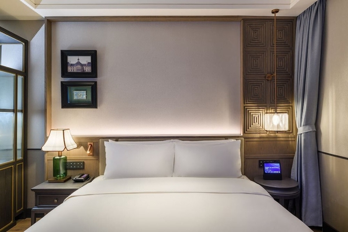 Imagen de la habitación del Hotel Wuhan Hankou Jiangtan Manxin Mansion. Foto 12