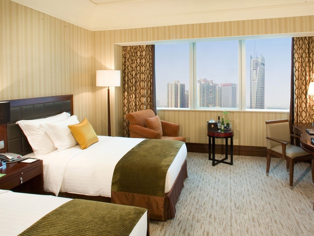 Imagen de la habitación del Hotel Wuhan Jin Jiang International. Foto 6