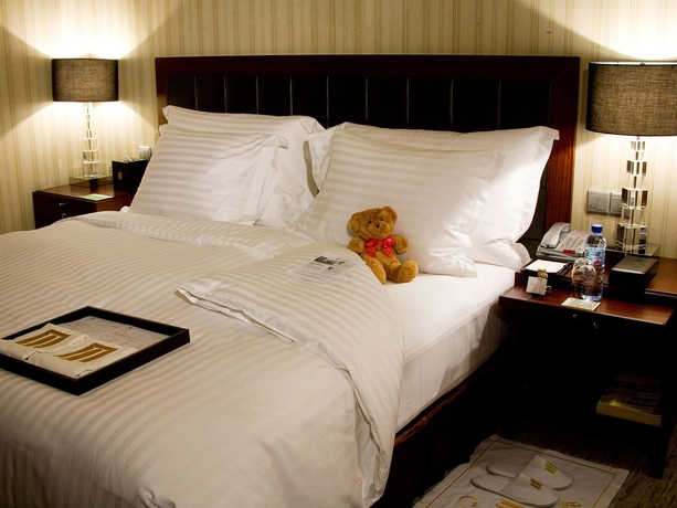 Imagen de la habitación del Hotel Wuhan Jin Jiang International. Foto 7