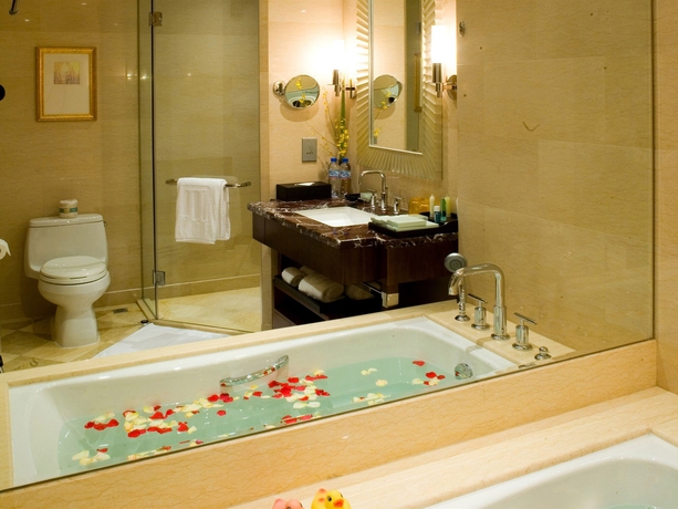 Imagen de la habitación del Hotel Wuhan Jin Jiang International. Foto 8