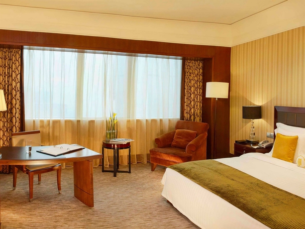 Imagen de la habitación del Hotel Wuhan Jin Jiang International. Foto 11