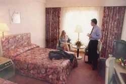 Imagen de la habitación del Hotel Wuhan Meilian Holiday City Center. Foto 4