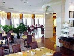 Imagen del bar/restaurante del Hotel Wuhan Meilian Holiday City Center. Foto 3