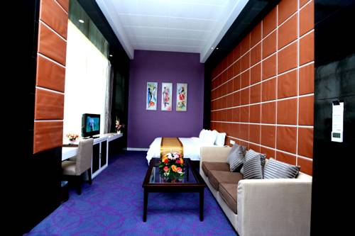 Imagen de la habitación del Hotel Wuhan New Beacon Jinyinhu International. Foto 2