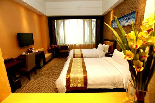 Imagen de la habitación del Hotel Wuhan New Beacon Jinyinhu International. Foto 3