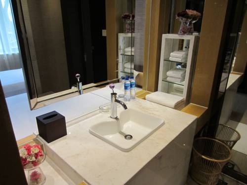 Imagen de la habitación del Hotel Wuhan New Beacon Jinyinhu International. Foto 8