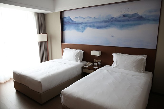Imagen de la habitación del Hotel Wuhan Optics Valley Convention. Foto 6