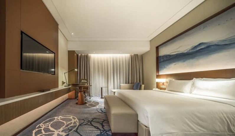 Imagen de la habitación del Hotel Wuhan Optics Valley Convention. Foto 9