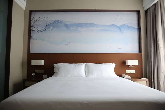 Imagen de la habitación del Hotel Wuhan Optics Valley Convention. Foto 16