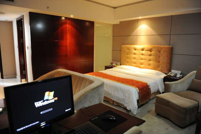 Imagen de la habitación del Hotel Wuhan Sentai Zhongyang. Foto 2