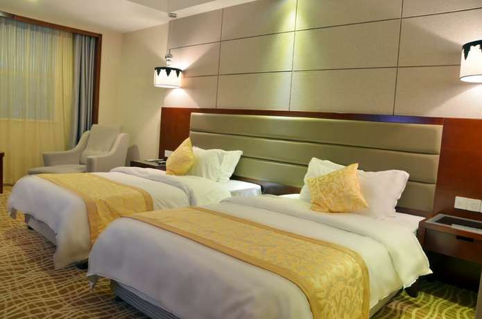 Imagen de la habitación del Hotel Wuhan Sentai Zhongyang. Foto 12