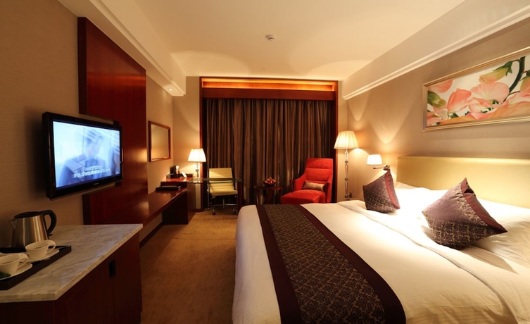 Imagen de la habitación del Hotel Wuhan Tianchimel. Foto 3