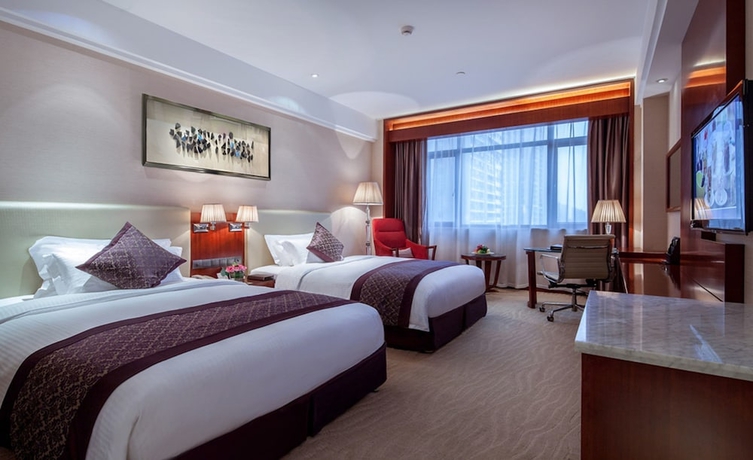 Imagen de la habitación del Hotel Wuhan Tianchimel. Foto 4