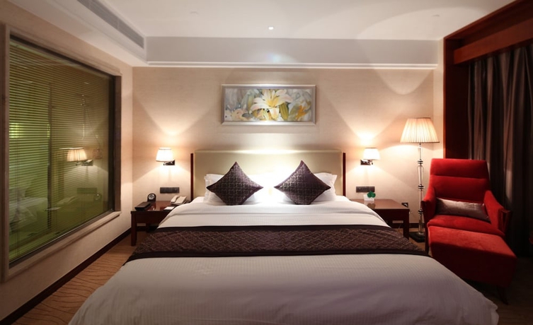 Imagen de la habitación del Hotel Wuhan Tianchimel. Foto 5