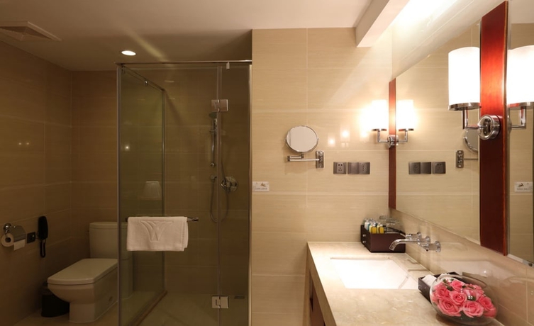 Imagen de la habitación del Hotel Wuhan Tianchimel. Foto 7