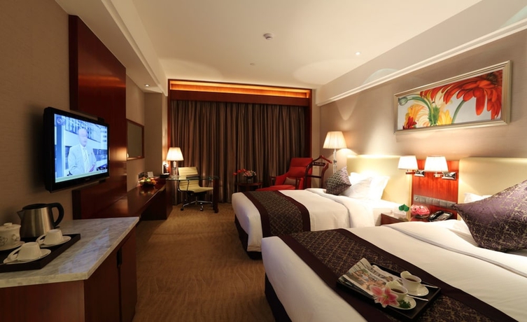 Imagen de la habitación del Hotel Wuhan Tianchimel. Foto 8
