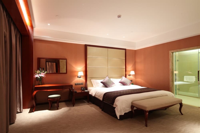 Imagen de la habitación del Hotel Wuhan Tianchimel. Foto 10