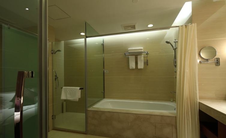 Imagen de la habitación del Hotel Wuhan Tianchimel. Foto 13