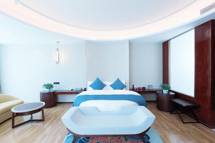 Imagen de la habitación del Hotel Wuhan Wellton Yiju. Foto 3