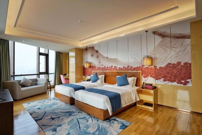 Imagen de la habitación del Hotel Wuhan Wellton Yiju. Foto 7