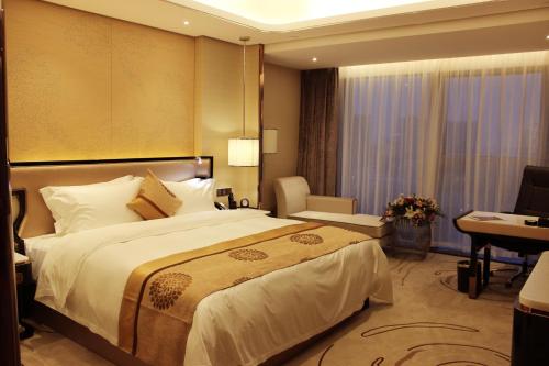 Imagen de la habitación del Hotel Wuhan You Yi International. Foto 5