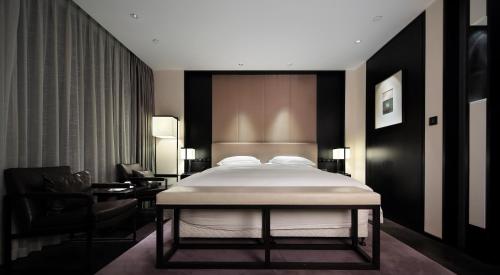 Imagen de la habitación del Hotel Wuhan Ziyuan. Foto 15