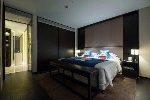 Imagen de la habitación del Hotel Wuhan Ziyuan. Foto 16