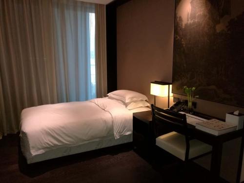 Imagen general del Hotel Wuhan Ziyuan. Foto 8