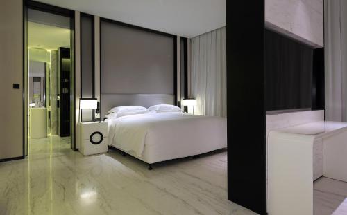 Imagen de la habitación del Hotel Wuhan Ziyuan. Foto 19
