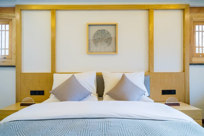 Imagen de la habitación del Hotel Wuhua Yishu Lijiang Flagship. Foto 3