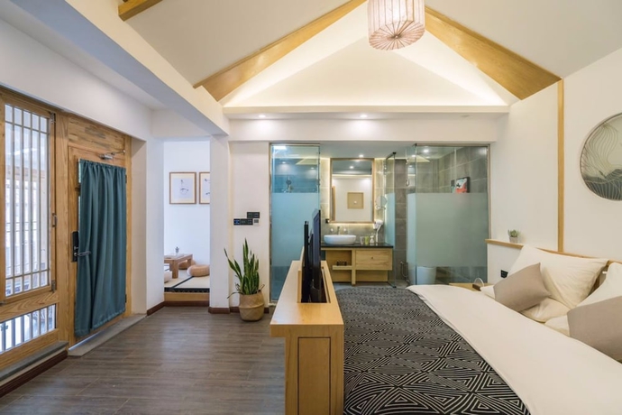 Imagen de la habitación del Hotel Wuhua Yishu Lijiang Flagship. Foto 9