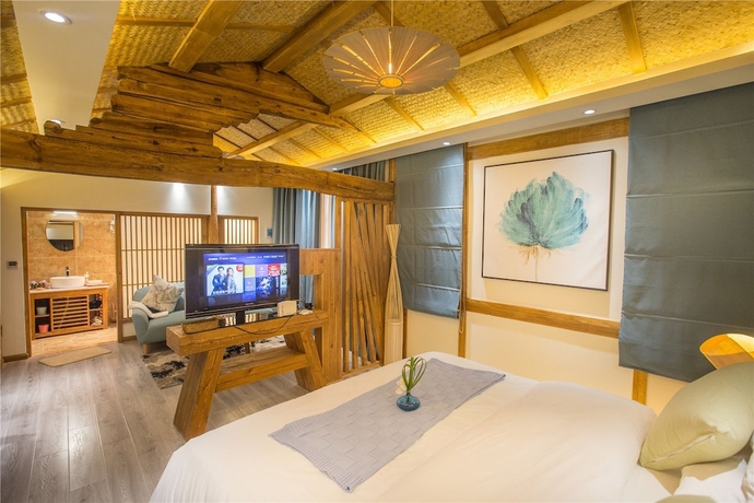 Imagen de la habitación del Hotel Wuhua Yishu Lijiang Flagship. Foto 10