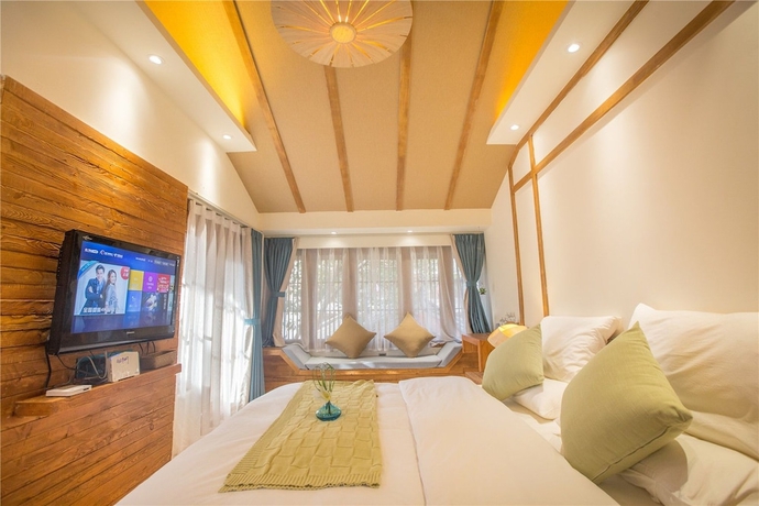 Imagen de la habitación del Hotel Wuhua Yishu Lijiang Flagship. Foto 11
