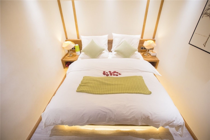 Imagen de la habitación del Hotel Wuhua Yishu Lijiang Flagship. Foto 12