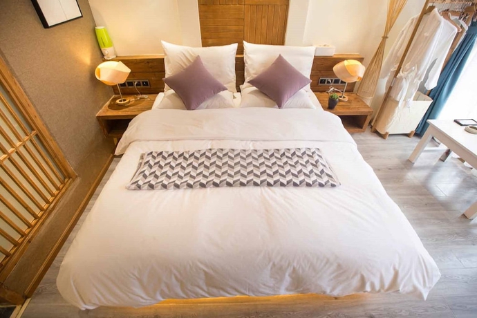 Imagen de la habitación del Hotel Wuhua Yishu Lijiang Flagship. Foto 13