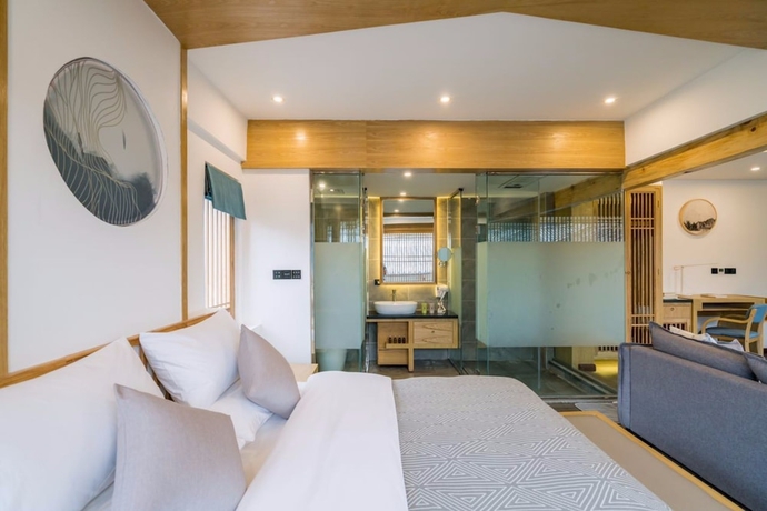 Imagen de la habitación del Hotel Wuhua Yishu Lijiang Flagship. Foto 14
