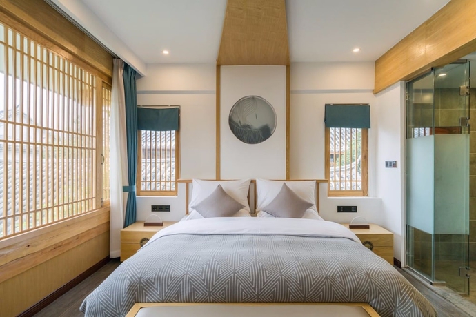 Imagen de la habitación del Hotel Wuhua Yishu Lijiang Flagship. Foto 16