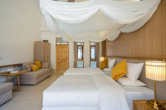 Imagen de la habitación del Hotel Wuhua Yishu Shouzhuo Park. Foto 12