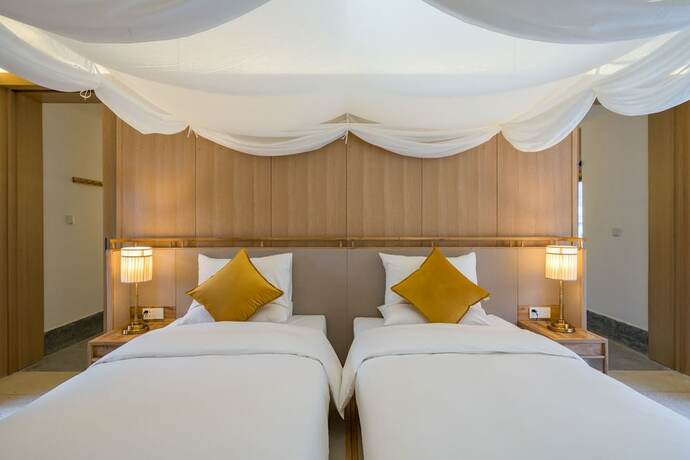 Imagen de la habitación del Hotel Wuhua Yishu Shouzhuo Park. Foto 13