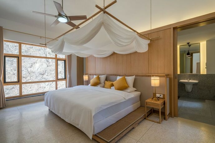 Imagen de la habitación del Hotel Wuhua Yishu Shouzhuo Park. Foto 15