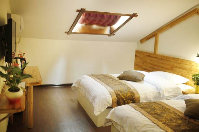 Imagen de la habitación del Hotel Wulingyuan Tu Youth Hostel. Foto 3