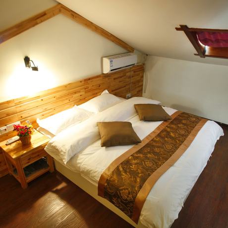 Imagen de la habitación del Hotel Wulingyuan Tu Youth Hostel. Foto 6
