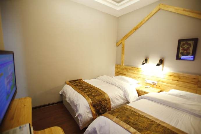 Imagen de la habitación del Hotel Wulingyuan Tu Youth Hostel. Foto 7