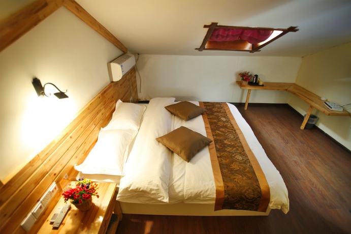 Imagen de la habitación del Hotel Wulingyuan Tu Youth Hostel. Foto 8