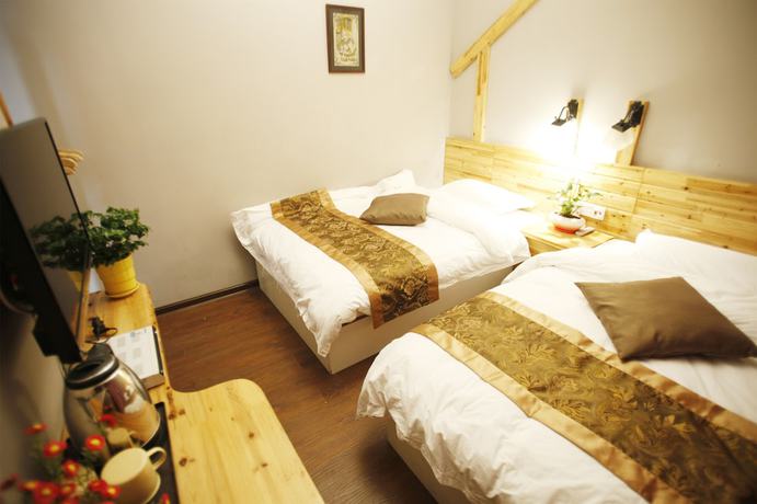 Imagen de la habitación del Hotel Wulingyuan Tu Youth Hostel. Foto 9