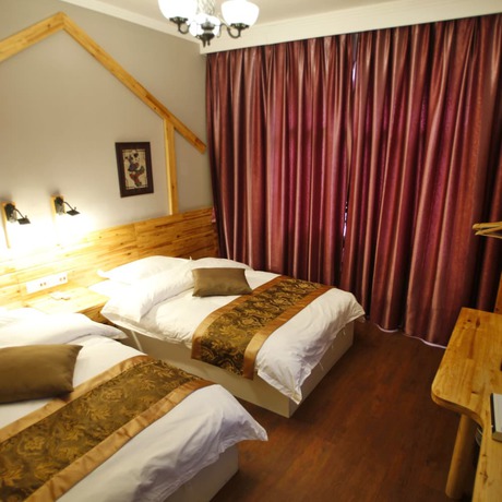 Imagen de la habitación del Hotel Wulingyuan Tu Youth Hostel. Foto 10