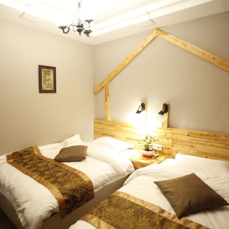 Imagen de la habitación del Hotel Wulingyuan Tu Youth Hostel. Foto 13