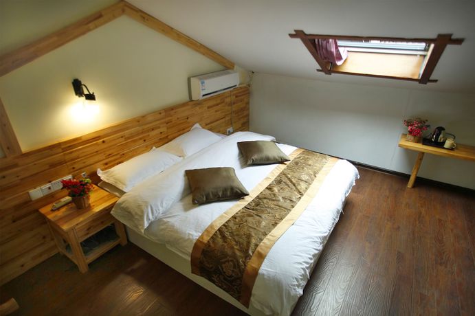 Imagen de la habitación del Hotel Wulingyuan Tu Youth Hostel. Foto 16