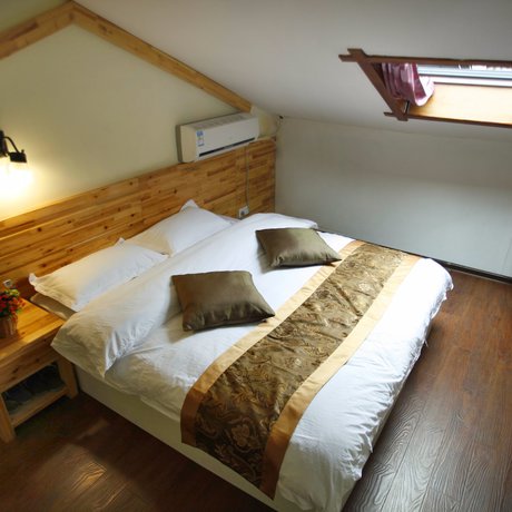 Imagen de la habitación del Hotel Wulingyuan Tu Youth Hostel. Foto 17