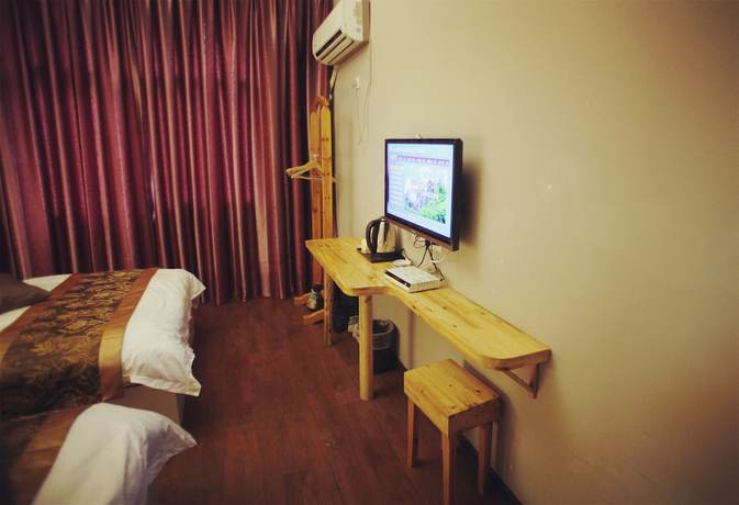 Imagen de la habitación del Hotel Wulingyuan Tu Youth Hostel. Foto 18